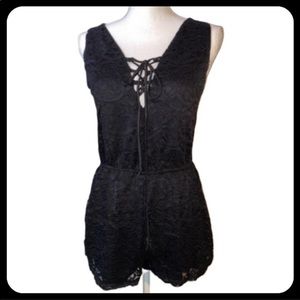 Ambiance Black Sleeveless Lace Up Lace Romper